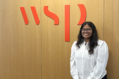 sowdamini ponnada standing in front of a WSP sign